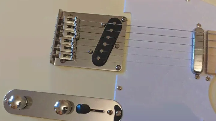 обзор сборки китайской реплики китайского Squier Telecaster желтая
